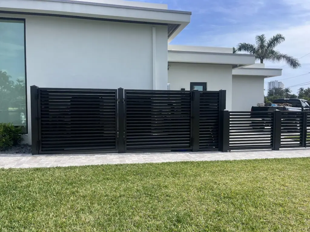 Aluminum privacy fence enclosure at a Broward County residential property